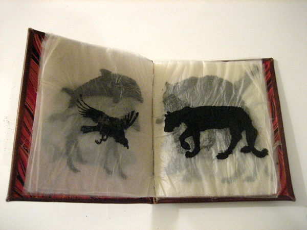 Fleshbook: india ink on goldbeaters skin; hand bound in leather and end papers resembling muscle