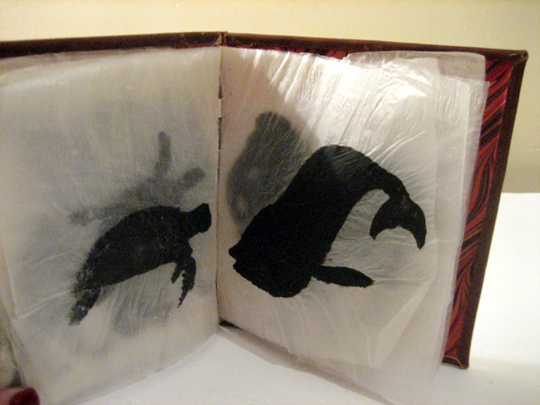 Fleshbook: india ink on goldbeaters skin; hand bound in leather and end papers resembling muscle